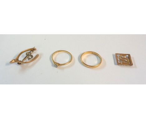 A 22ct. gold wedding band, a marked 18ct. and PLAT tiny diamond solitaire ring, a 9c wishbone pattern brooch and S initial