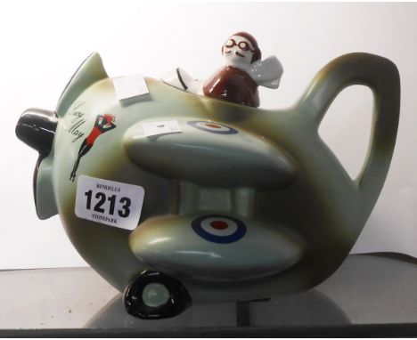 A Carltonware novelty teapot in the form of a World War I bi-plane with transfer printed and painted decoration