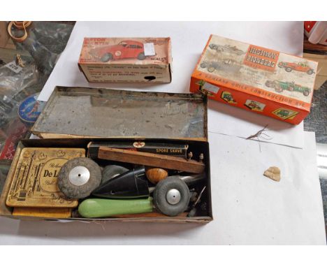 A vintage Scalex tinplate model of an Aston Martin DB2 in original box, a boxed Gowland quick construction kit of a 1953 Jagu