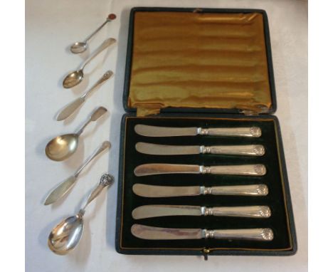 A cased set of six silver handled dessert knives - sold with two silver caddy spoons, two other spoons and two small butter k