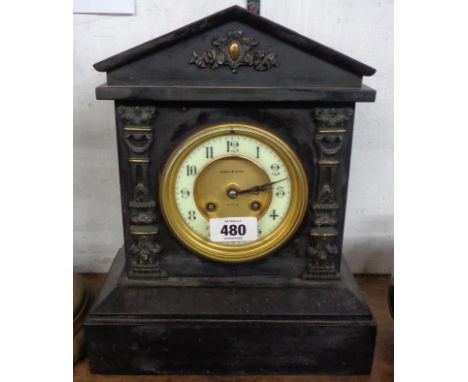 A late Victorian black slate cased mantel clock of architectural design with gilt dial centre marked for Lyons &amp; Sons, wi