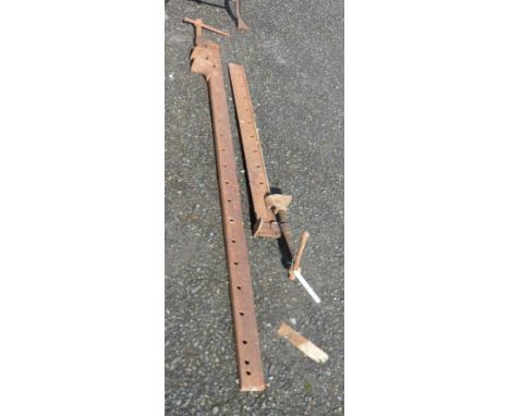 Two old cast iron sash clamps - one a/f