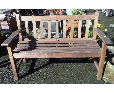 A Lister teak garden bench