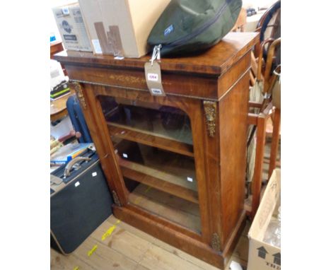 A 77cm Victorian inlaid rosewood pier cabinet with gilt metal mounts and material lined interior enclosed by a glazed panel d