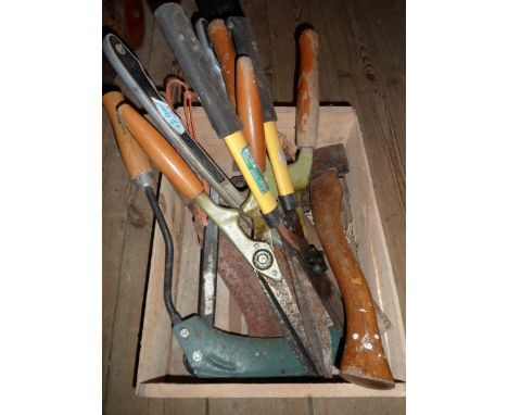 A wooden crate containing a quantity of garden and other of tools including shears, etc.
