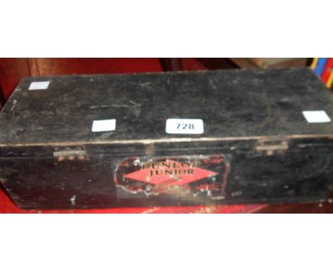 A vintage Dunlop Junior foot pump box containing a Sutty car foot pump