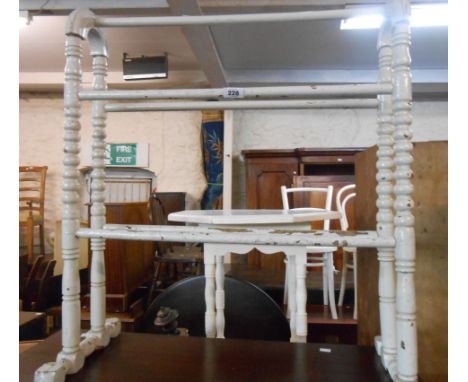 A Victorian later painted wood double towel rail with part bobbin turned supports