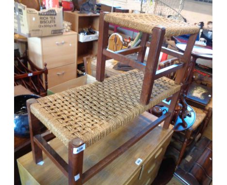 A vintage stained wood and woven seagrass double foot stool - sold with a single similar