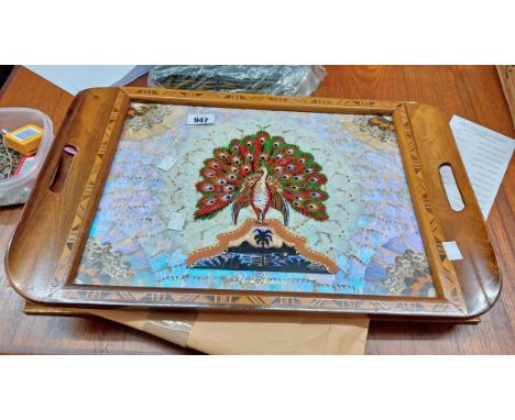 A large vintage butterfly wing inset wooden tray with stencilled peacock decoration with Rio De Janeiro beneath with paper Br