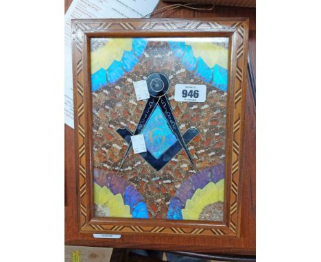 A small vintage butterfly wing picture with central Masonic square and compass symbol and Rio De Janeiro beneath with paper B