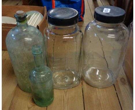 Two vintage glass sweet jars with screw on Bakelite tops - sold with an old chemist's bottle and one other