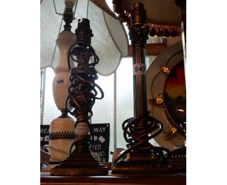 An old brass Corinthian column table lamp - sold with a smaller similar