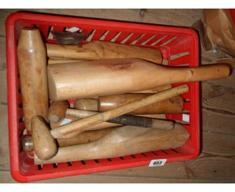 A box containing a quantity of lead and copper working tools including dressers, planishing hammers, etc.