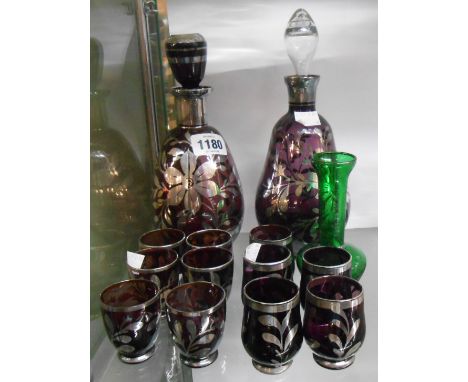 A vintage Venetian amethyst glass liqueur set decorated with silver lustre overlay comprising decanter and six glasses - sold