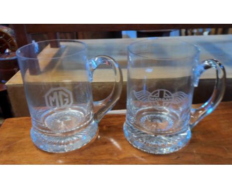Two glass tankards etched with Morgan and MG car logos