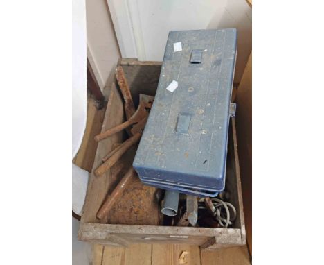 A wooden crate containing a quantity of old tools including blow torch, soldering irons, tap and die, etc.