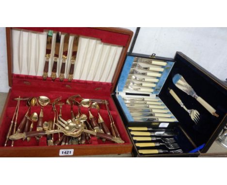 Two cased sets of silver plated fish knives and forks - sold with a polished wood canteen containing Far Eastern bronze cutle