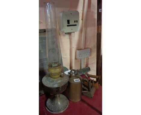 An old aladdin oil lamp with chimney (corroded) - sold with a brass garden sprayer and two antique cast iron flat irons
