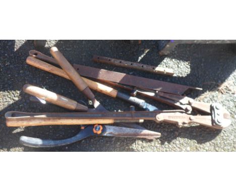 A selection of tools including bolt cutters, shears, etc.