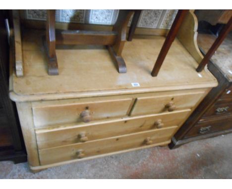 A 1.04m Victorian pine dressing chest with tile set splash back, two short and two long graduated drawers under, set on bun f