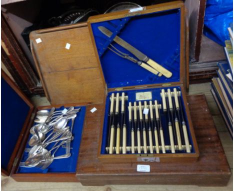 A mahogany canteen containing a quantity of silver plated tablespoons and dinner forks - sold with another with old steel cut