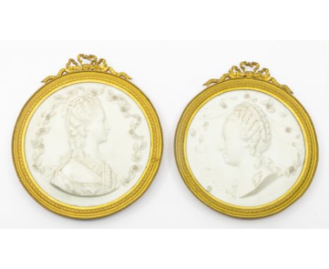 Two 19th century French Parian portrait plaques of ladies, one a Queen, both titled underneath relief portrait, one Elizabeth