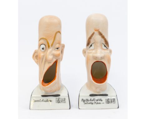 Two vintage Schafer & Vater ceramic smoking head ashtrays, titled "By the light of the Silver Moon", and "Sweet Adeline", one