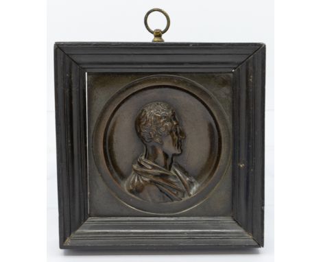 A mid-19th century bronze portrait plaque of The Duke of Wellington, unsigned, in painted wooden frame, overall approx. 14.4c