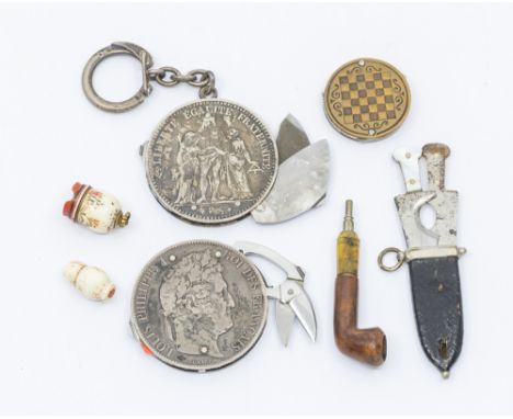 A collection of mixed items comprising; two novelty 5 Francs coins amended into pocket knives with coin face and back and mec