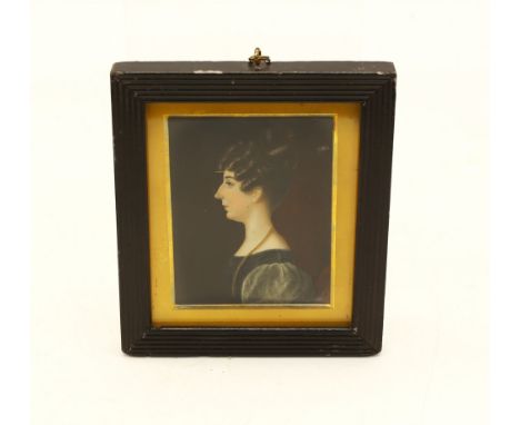 English School (19th century), Portrait of a lady facing right, Watercolour on ivory, 6.5cm x 8.4cm, In gilt surround and bla