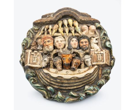 A late 20th century ceramic plaque, in relief depicting animals and figures in Noah's Ark, surrounded by waves, initialled an