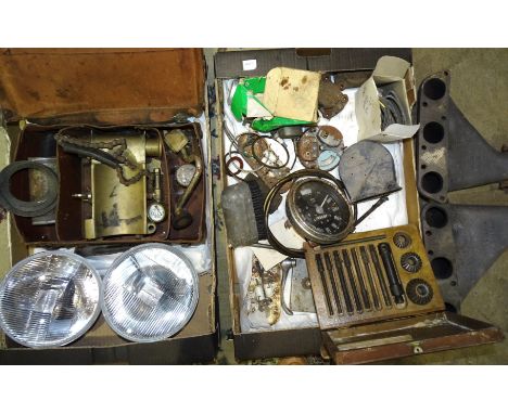 A quantity of vintage motoring items, including a cased set of Sykes Pickavant tools, halogen lamps, two CarCast manifolds an