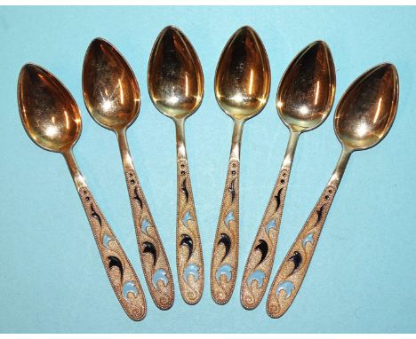 A set of six Russian silver-gilt teaspoons with enamel decoration, marked *875, three niello silver coffee spoons, (two marke