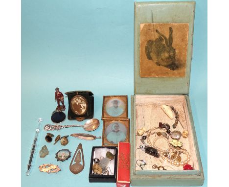 A sterling silver leaf brooch, a clear glass 'Mother &amp; Babe' bobbin, a small quantity of jewellery, a silver bookmark and