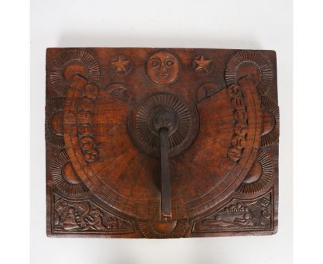 AN UNUSUAL CARVED FRUITWOOD SUNDIAL. with a moon and stars above signs of the Zodiac and two carved scenes, one depicting a m