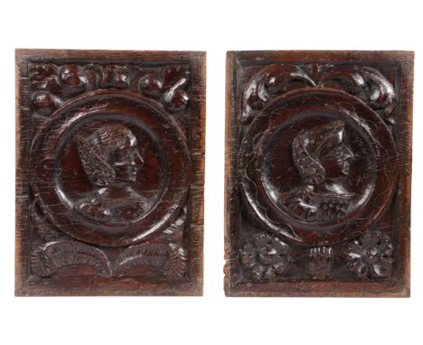 AN INTERESTING PAIR OF HENRY VIII OAK ROMAYNE-TYPE PORTRAIT PANELS, CIRCA 1540. Male and female, each carved with a portrait 