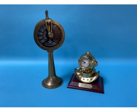 A model Ship's telegraph and a Diver's helmet clock