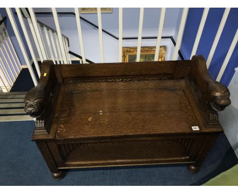 A carved oak Monks bench