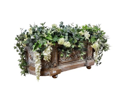 REPRODUCTION PLANTER, of large proportions, in plaster composition with artificial foliage105cm wide