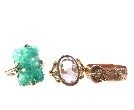 THREE DRESS RINGS, NINE CARAT GOLD comprising a Victorian style buckle ring, a cameo portrait ring and a Chinese style hard s