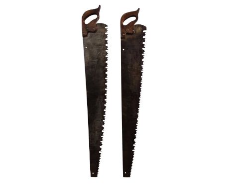THREE CROSSCUT SAWS, including one two-man saw, with wooden handlesthe two-man saw 127cm long