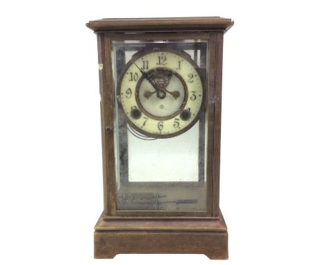 FRENCH BRASS MANTEL CLOCK, LATE 19TH CENTURY  with four glass panels and cream enamel dial29cm high