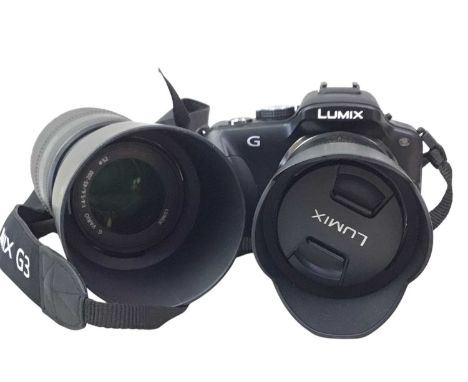 PANASONIC LUMIX DMC G3W DIGITAL CAMERA, AND ADDITIONAL 45-200 LENS  comprising a Panasonic Lumix digital camera, marked DMC G
