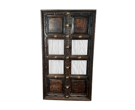 CARVED AND SLATTED WOOD SHUTTER PANEL, with gilt metal fittings162cm high, 90cm wide