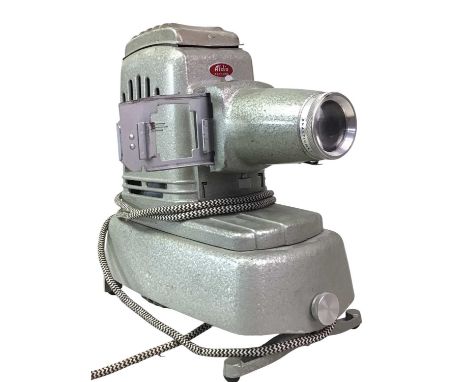 EUMIF PROJECTOR, AND OTHER ITEMS along with an Aldis slide projector, as well as a group of reelsprojector 25cm long 
