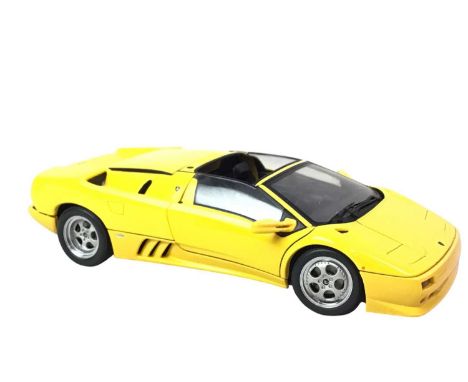 COLLECTION OF MODEL VEHICLES, 1:18 SCALE  from various manufacturers comprising a 'Bugatti EB 16.4 Veyron', 'McLaren F1 Proto