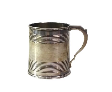 GEORGE IV SILVER CHRISTENING MUG, MAKER W.E, LONDON 1822 of tapered cylindrical form with reeded borders7.5cm highQty: 115g