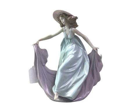 LLADRO CERAMIC FIGURE, ALONG WITH A NAO LAMP the Lladro modelled as a dancer, along with a Nao figural lamp with shadethe Lla