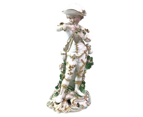 DERBY / CHELSEA PORCELAIN FIGURE, LATE 18TH / EARLY 19TH CENTURY  depicting a boy with flowers and wearing a hat22cm high