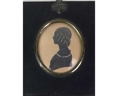 TWO PORTRAIT MINIATURES, 19TH CENTURY  comprising a female in profile on paper and a silhouette of a female bust on paper17cm